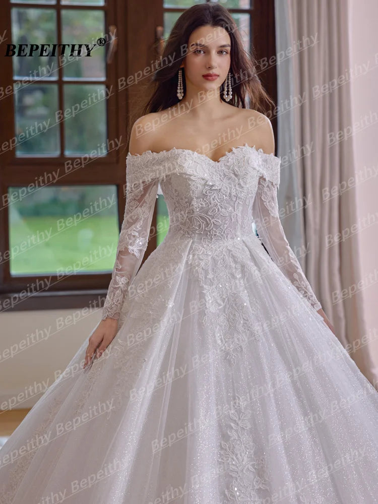Robe de mariée princesse à perles – CLEVI Paris