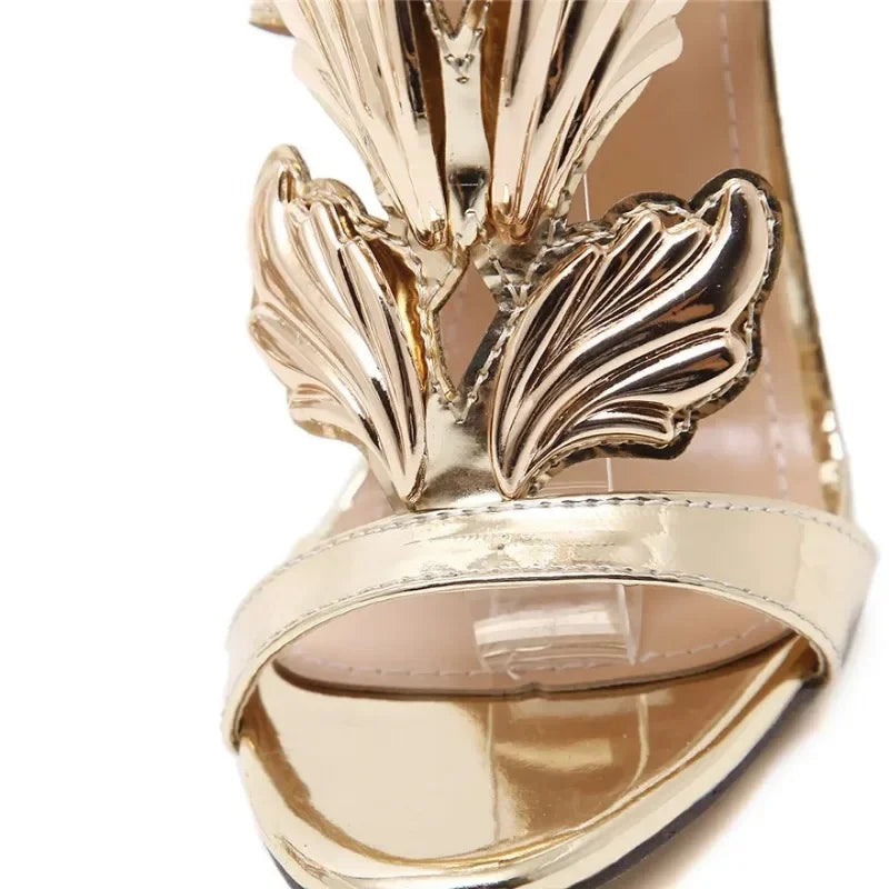 Talons Aiguille Femme Style Romain Ailes Métalliques Cuir Verni Doré – CLEVI Paris