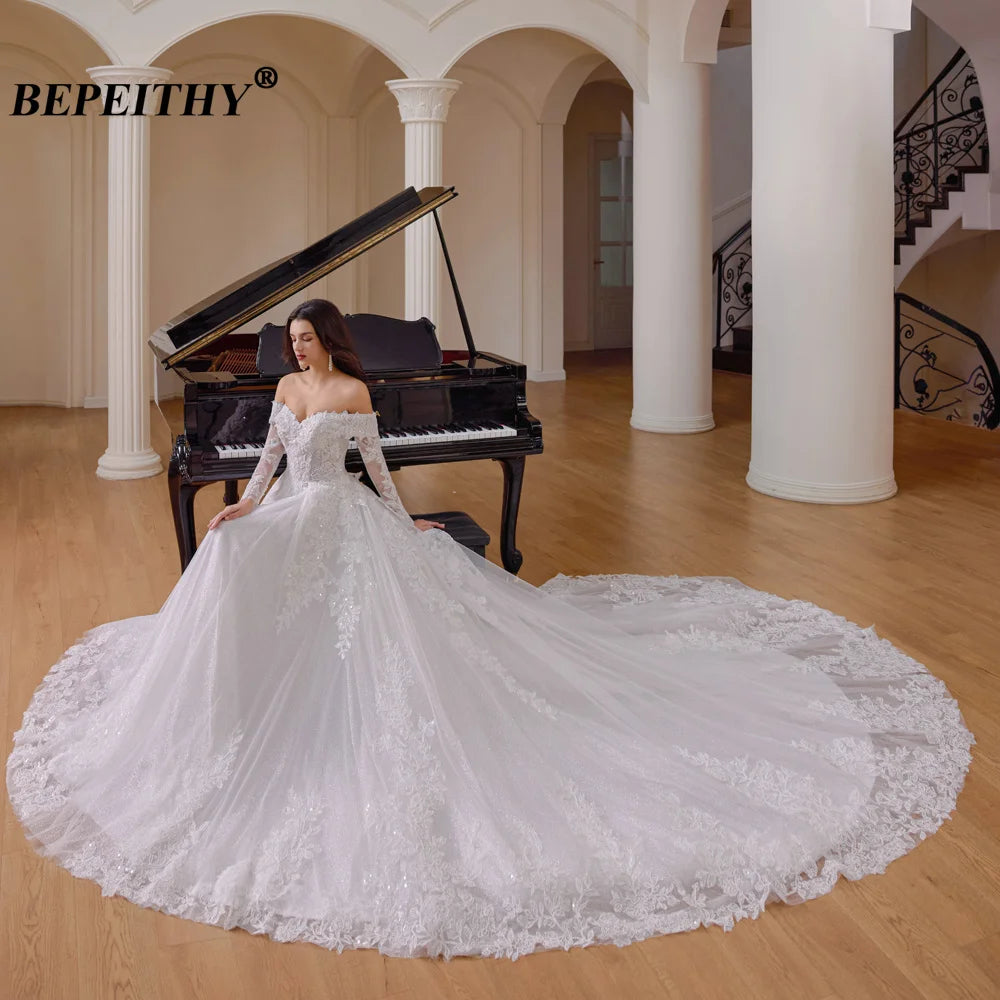 Robe de mariée princesse à perles – CLEVI Paris