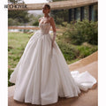 Robe de mariée ligne A sans manches en satin – CLEVI Paris