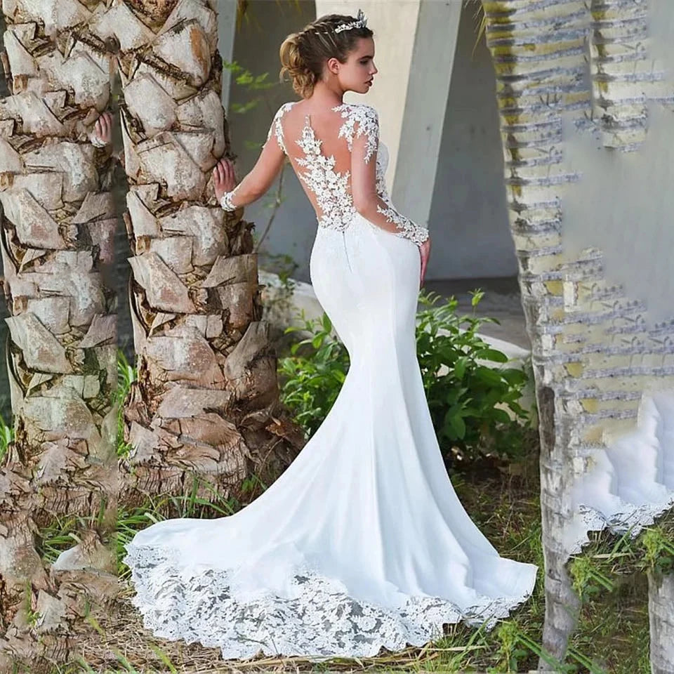 Robe de mariée sirène en satin à manches longues – CLEVI Paris