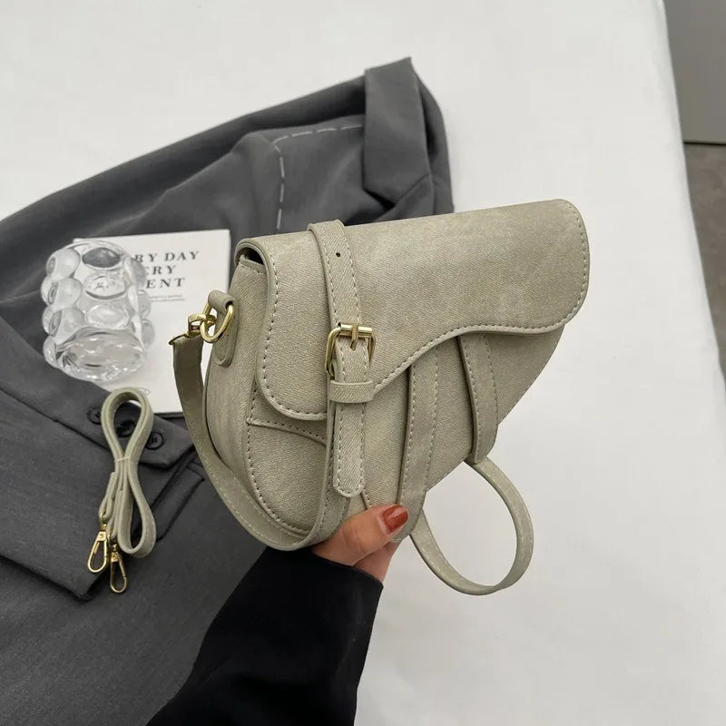 Sac bandoulière femme forme selle – CLEVI Paris