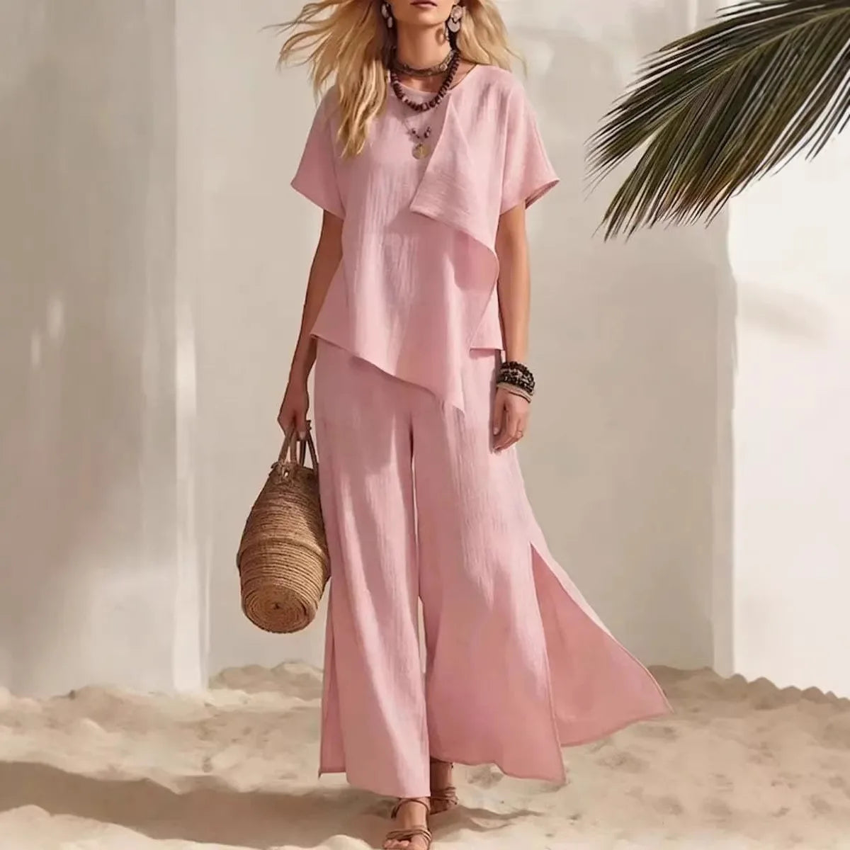Ensemble femme haut asymétrique et pantalon – CLEVI Paris
