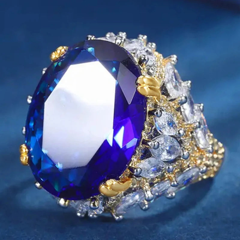 Bague Cocktail Femme Huitan A257 – Zircone Cubique Ovale Bleue Bicolore Tendance