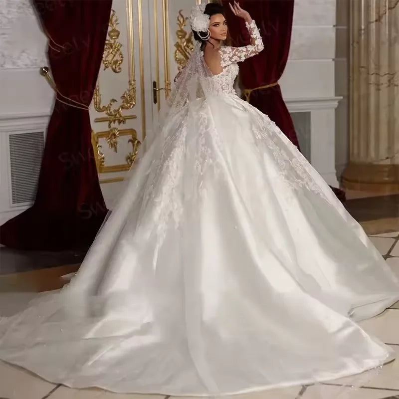 Robe de mariée princesse à manches longues – CLEVI Paris