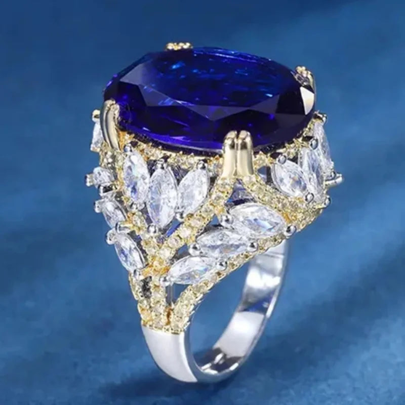 Bague Cocktail Femme Huitan A257 – Zircone Cubique Ovale Bleue Bicolore Tendance