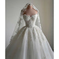 Robe de mariée ligne A en tulle épaules dénudées – CLEVI Paris