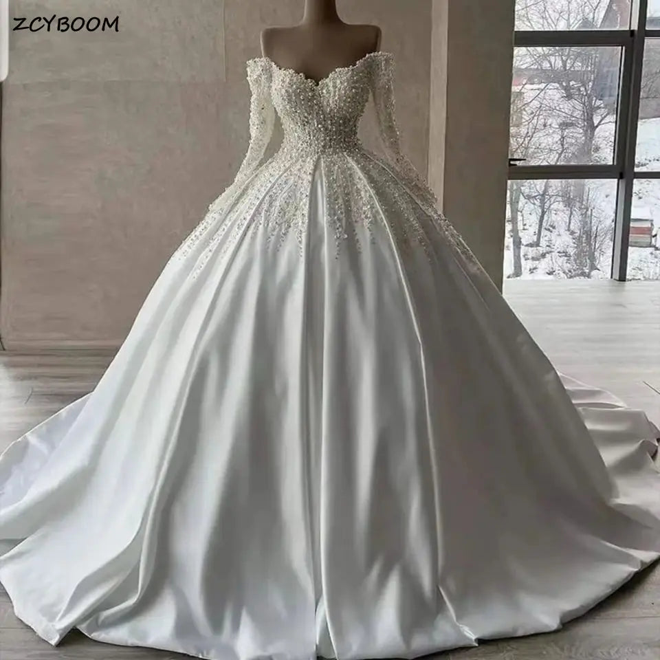Robe de mariée princesse satinée – CLEVI Paris