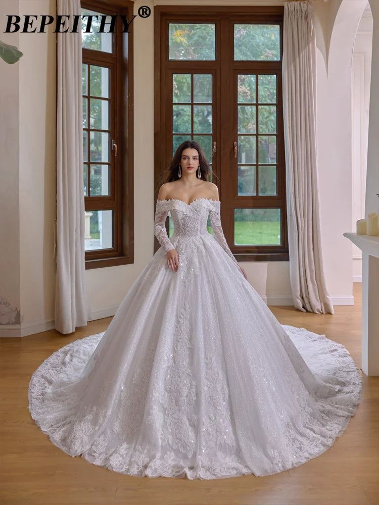 Robe de mariée princesse à perles – CLEVI Paris
