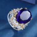 Bague Cocktail Femme Huitan A257 – Zircone Cubique Ovale Bleue Bicolore Tendance