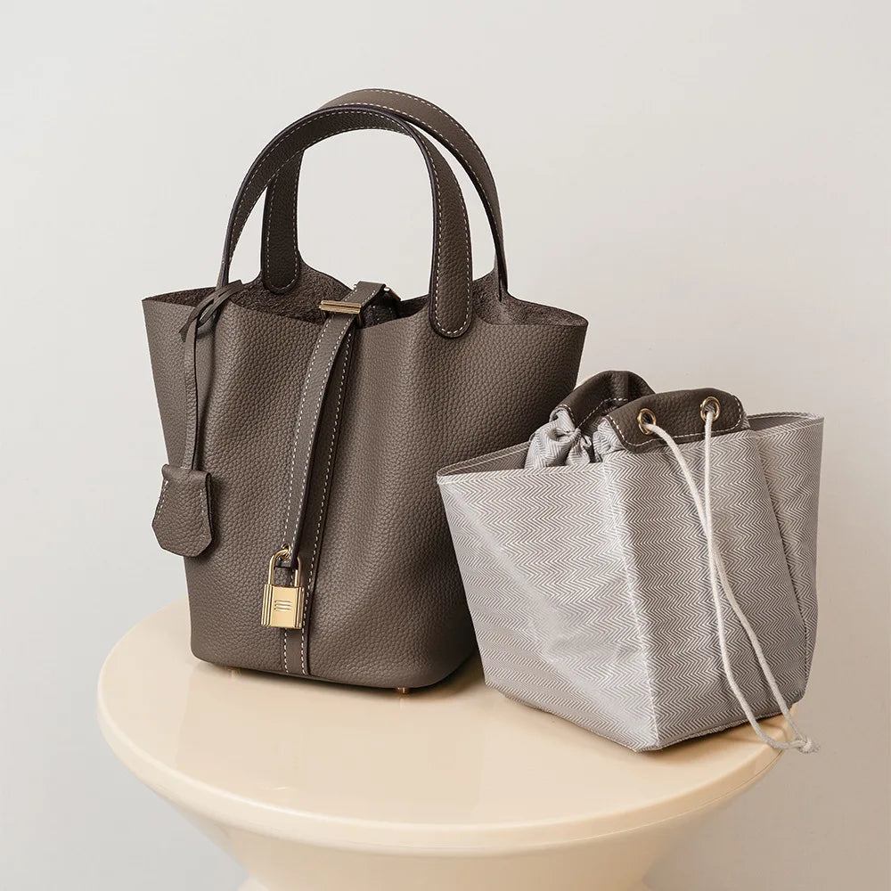 Sac Seau Femme Cuir Véritable TOGO Cylindrique Commuter Premium – CLEVI Paris