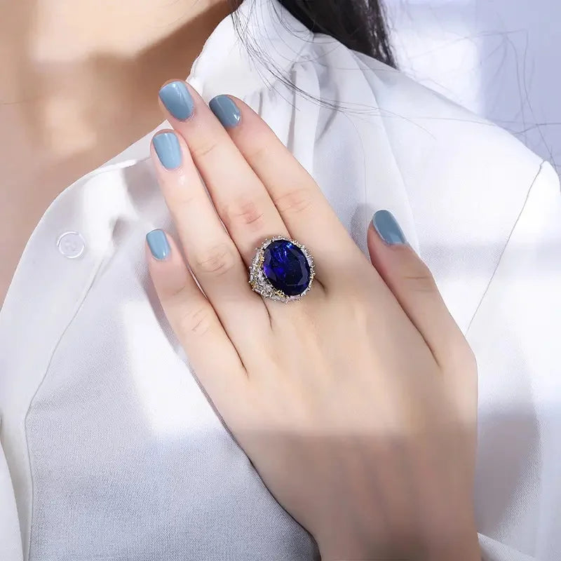 Bague Cocktail Femme Huitan A257 – Zircone Cubique Ovale Bleue Bicolore Tendance