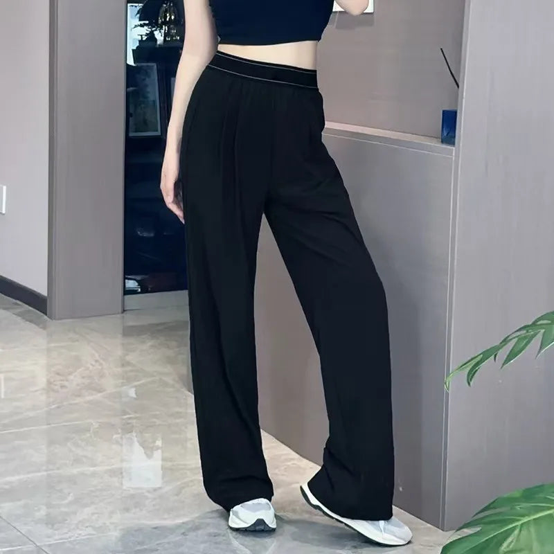 Pantalon femme ample à taille élastique – CLEVI Paris